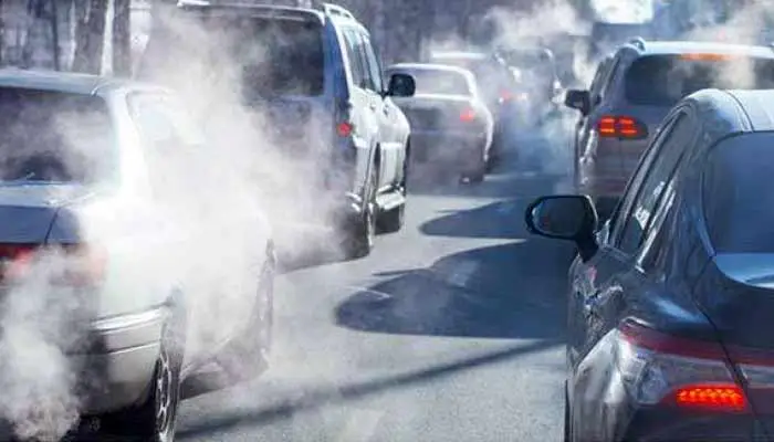 SMOKE EMITTING VEHICLES IN TRAFFIC